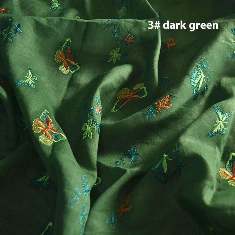 Pure ramie embroidery cloth hanfu fabric in beige, dark green, or grass green, showing texture.