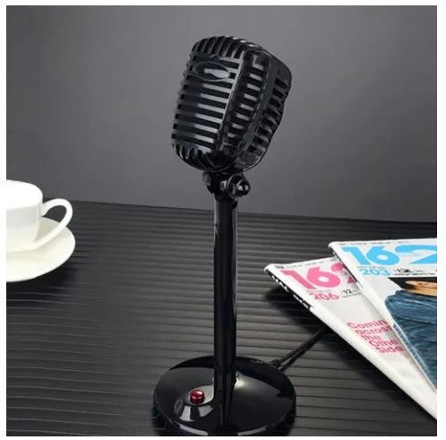 Black USB computer microphone on an adjustable desk stand with a weighted base.