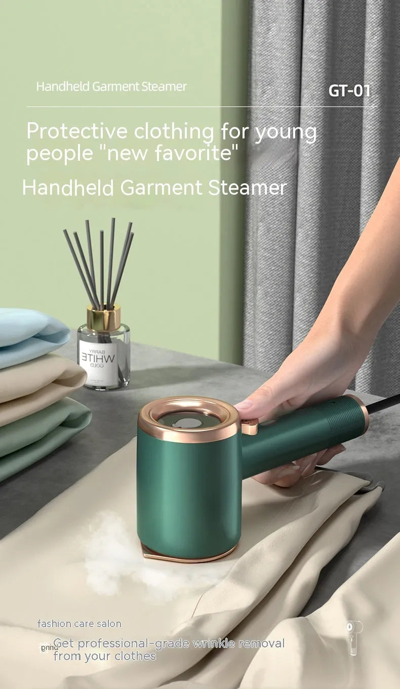 Mini portable handheld garment steamer in green with titanium soleplate and 50ml water tank