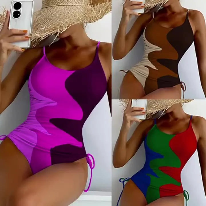 Women's blue sleeveless one-piece swimsuit with fixed trunks and backless design for swimming sports
