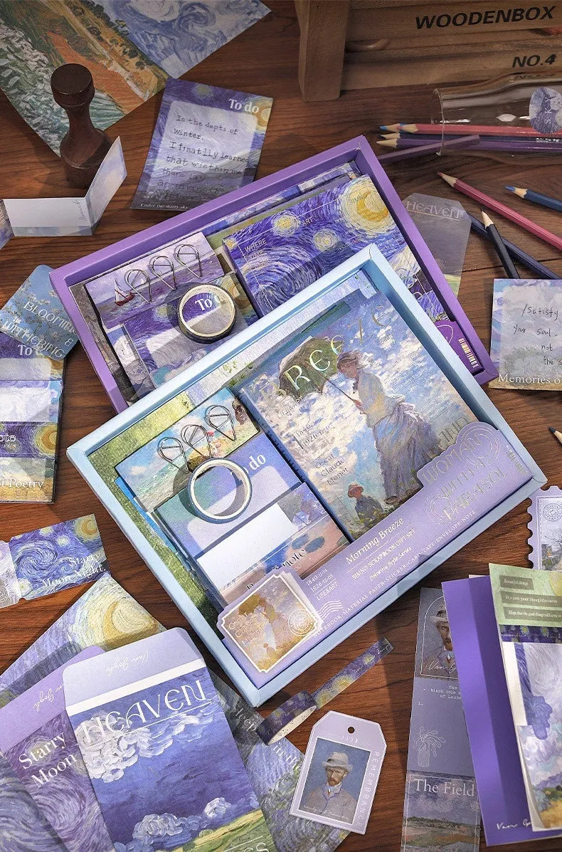 Hand Account Suit creative journal gift box open to show A6 grid notebook, assorted papers, cards, stickers, and a water drop bookmark.