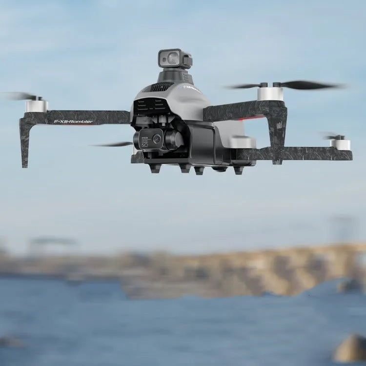 White foldable quadcopter drone with camera and propeller guards on a grey background