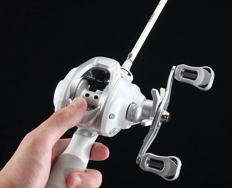 Micro baitcasting fishing reel with drop wheel design for small bait applications