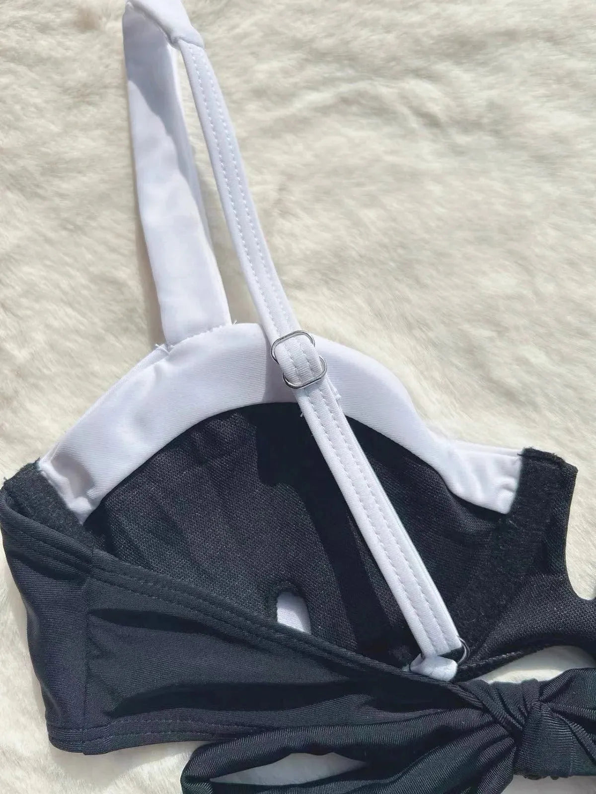 Black low waist women's bikini swimsuit with stitching split design detail