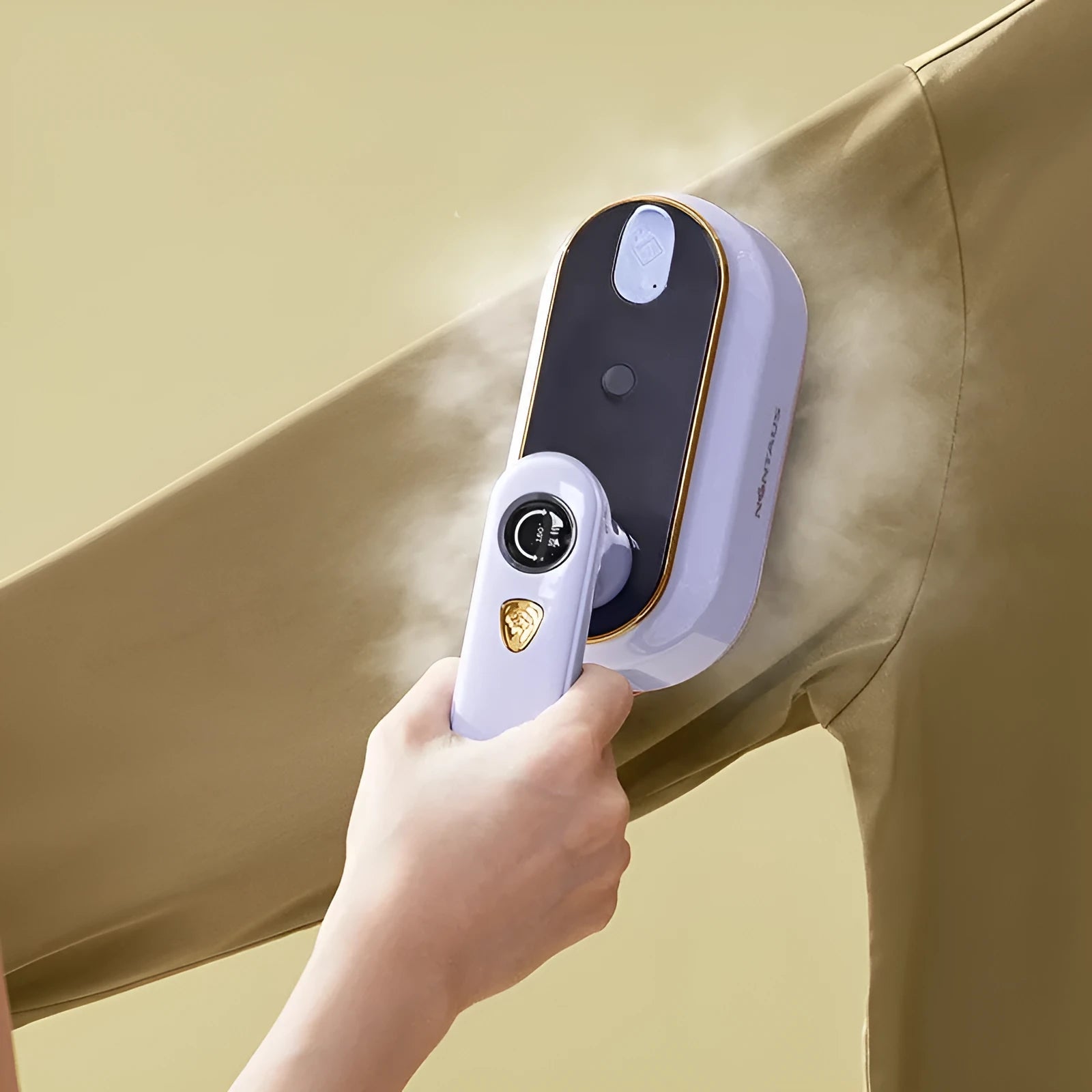 Folding portable steam iron with ceramic soleplate in light purple colour showing compact travel design