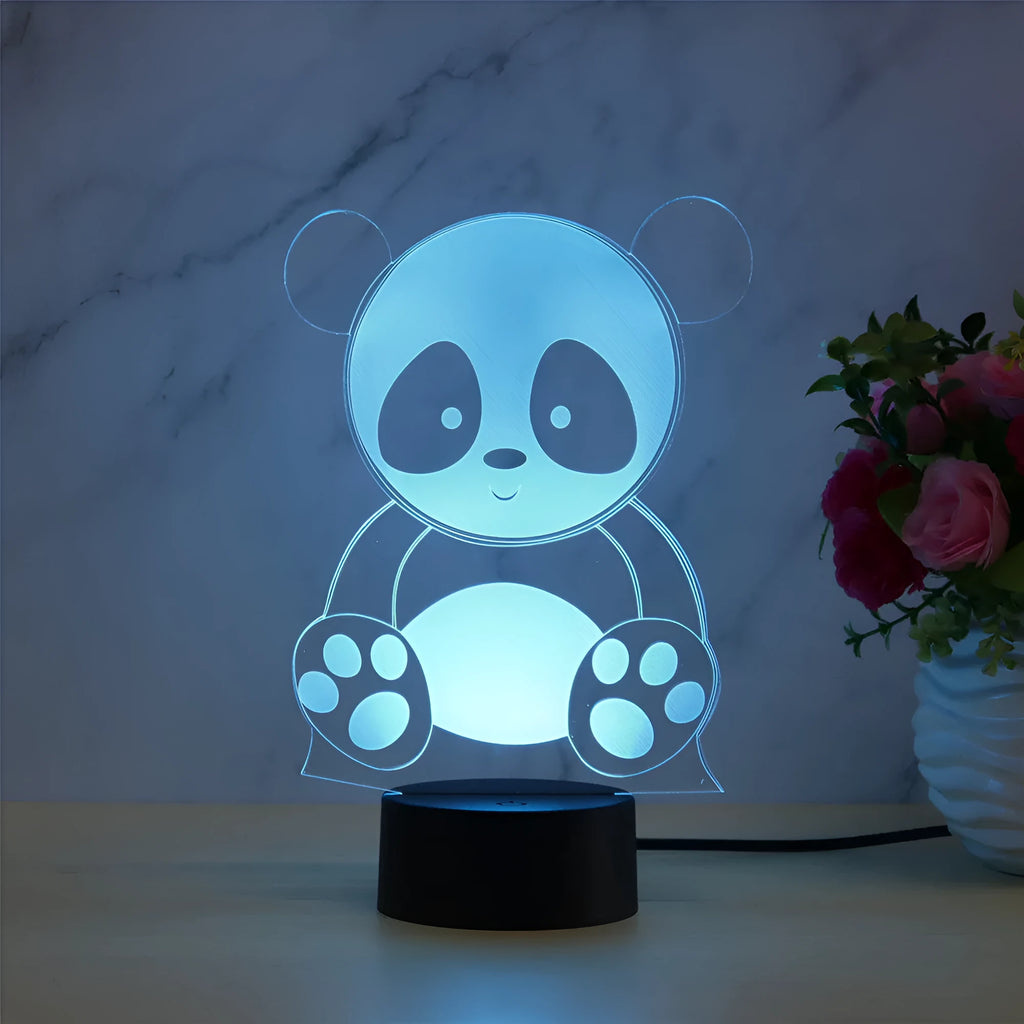 Panda shaped night light with remote control showing seven colour LED illumination