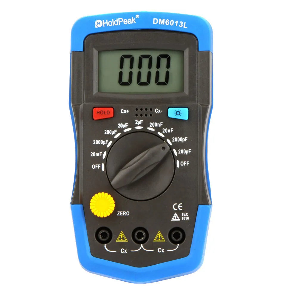 DM6013L handheld digital capacitance meter with LCD backlight, test leads, and display showing measurement