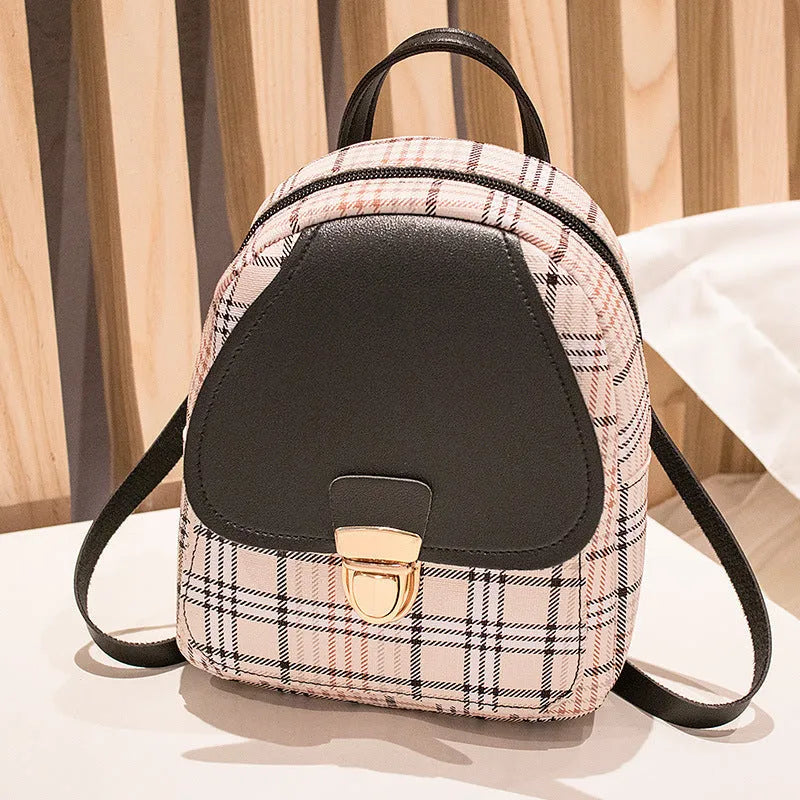 Diagonal cut one shoulder phone bag in PU fabric available in five colours.