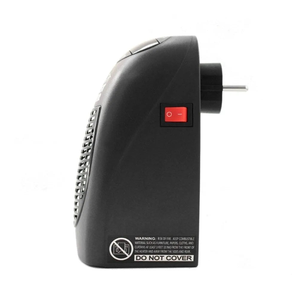 Small black ceramic electric heater with digital display and a rotating plug on a desk.