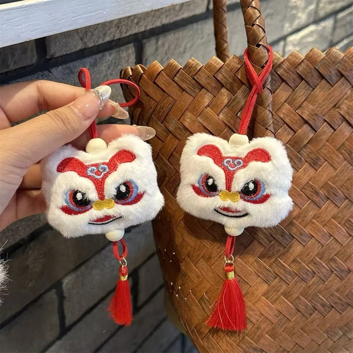 Blue Chinese style plush lion keychain ornament with star stone details and tassel