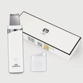 White bottle of blackhead remover pore cleaner for face, designed to remove grease, acne, and dead skin