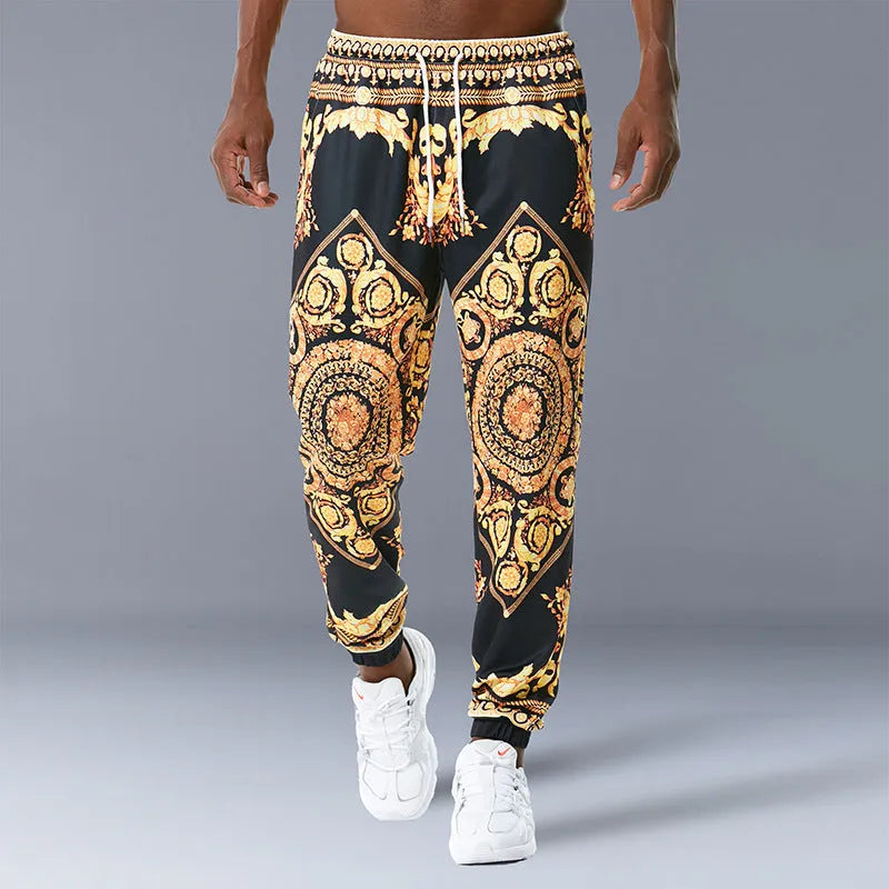 Printed jogging pants in loose fit with drawstring waist, small leg opening, and ribbed hem, available in multiple colours