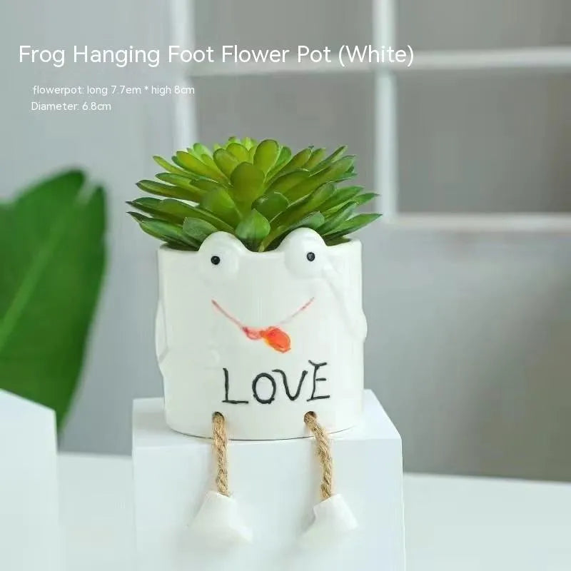 Ceramic hanging foot flowerpot in a cartoon style, shown as a desktop planter for succulent plants.