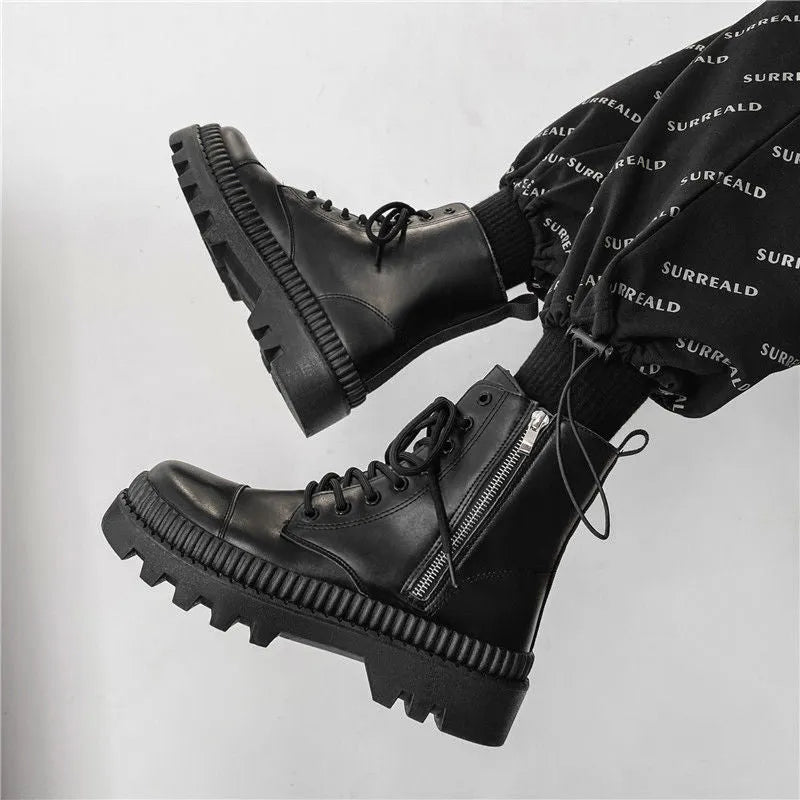 Men's black frosted leather platform ankle boots with a side zip and high-top design.