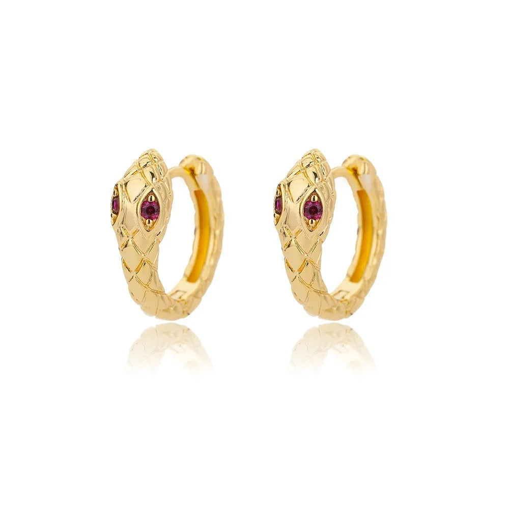 Women's geometric butterfly-shaped copper earrings with heart and star details in various colours.