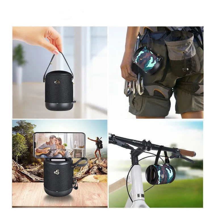 Compact black waterproof Bluetooth speaker with a carry belt, showing control buttons and a leather-style finish.