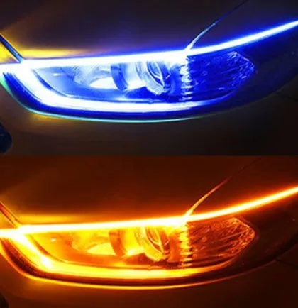 60cm ultra-thin car LED tear light guide strip in white yellow two-colour mode on a dark background