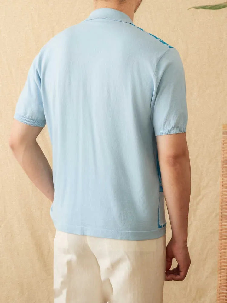 A striped knitted cardigan polo shirt with short sleeves and a lapel collar, shown in a light blue colour.