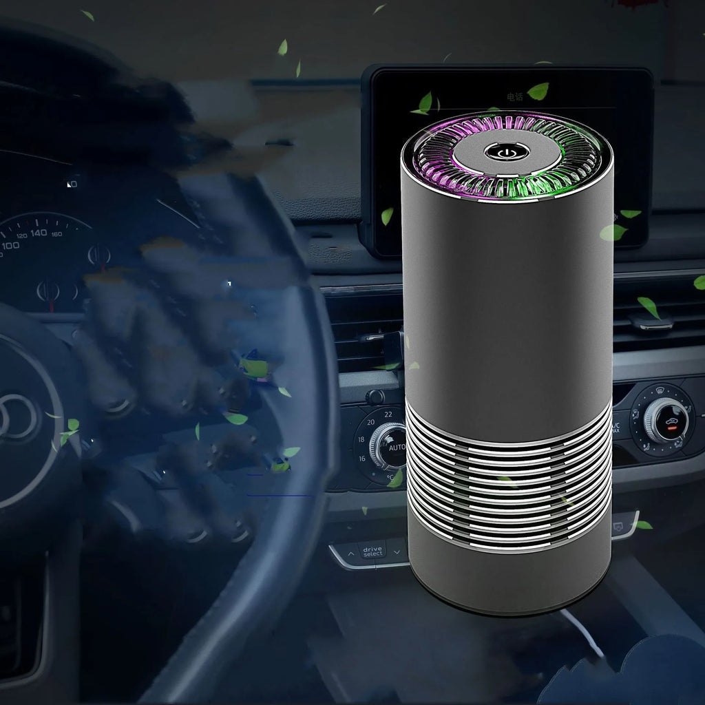 Compact black car and desktop air purifier with aluminium alloy case on a wooden desk.
