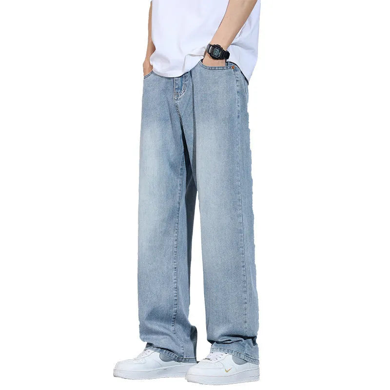 Lightweight ice silk denim straight-leg trousers in vintage blue with a zip-fly opening.
