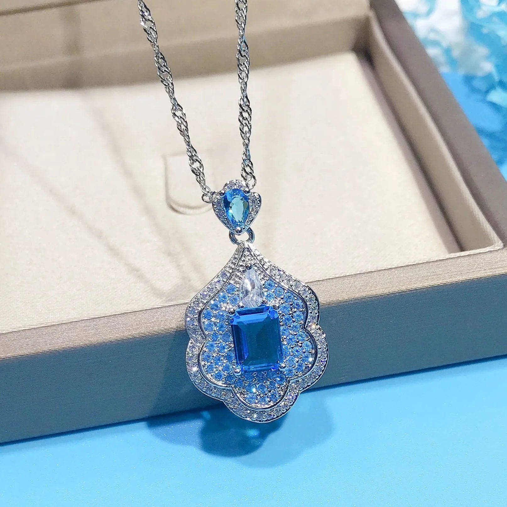 Sea blue geometric copper pendant with aquamarine topaz mirror finish