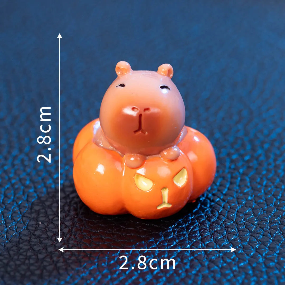 Cute capybara Halloween resin decoration figures in eight different costume designs including pumpkin and vampire.