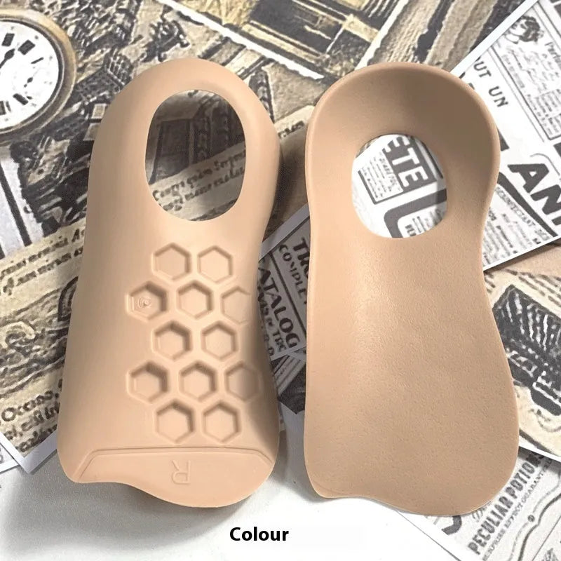Pair of varus correction arch support insoles in TPR material on a white background.