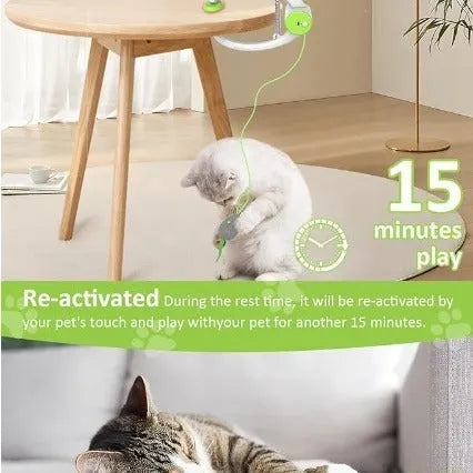 Electric beating mouse cat toy hanging from door holder in pink plastic
