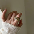 Chinese-style irregular geometric resin ring in brown and white colour options
