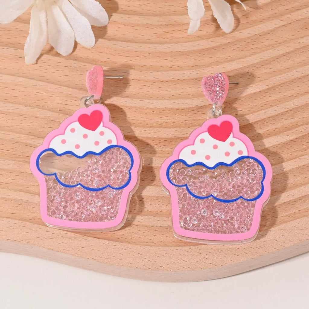 Colourful acrylic drop earrings with fruit and dessert charms including strawberry, cherry, pineapple, and watermelon.