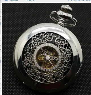 Retro mechanical pocket watch with hollow floral dial and transparent case back in alloy.