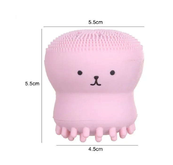 Cartoon octopus silicone wash brush in pink for manual facial cleansing and massage
