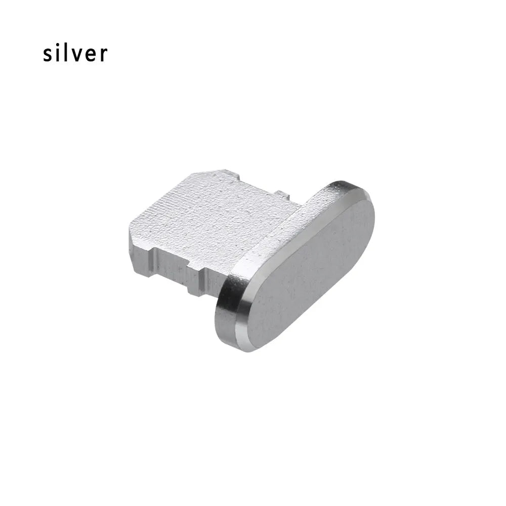 Aluminium alloy iPhone charging port dust plug in multiple colours including gold, silver, blue, red, grey, black, and rose gold.