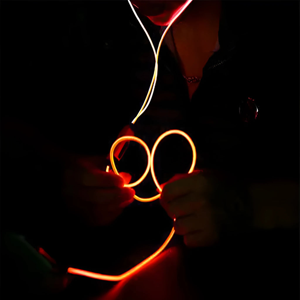 Blue LED light-up earphones with a remote control, compatible with iPhone and Samsung phones.