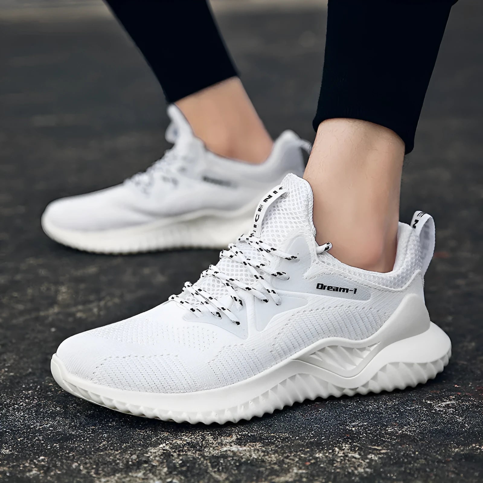 Adult breathable running shoe with mesh upper, front strap, and MD sole on a white background.