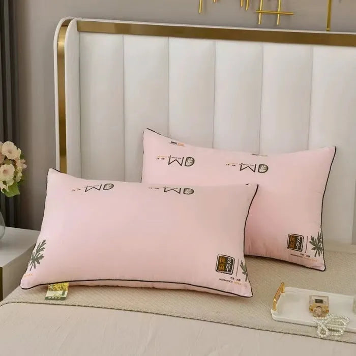 Polyester chemical fibre pillow core in light blue on a bed, showing its plump fill.