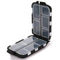Compact PVC fishing lure storage box in green, 9.9×6.5×3cm, with transparent lid and buckle closure