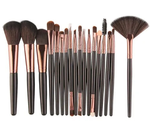 MAANGE 18-piece makeup brush set with fan brush displayed in clear hard storage case with individual slots.