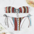 Women's printed lace-up split swimsuit in mixed colours, showing sleeveless one-piece design.