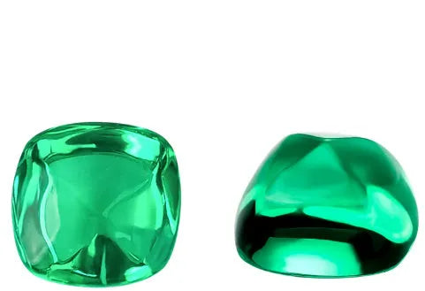 Cultivated emerald gemstones in Columbia green colour showing round, oval and emerald cut examples