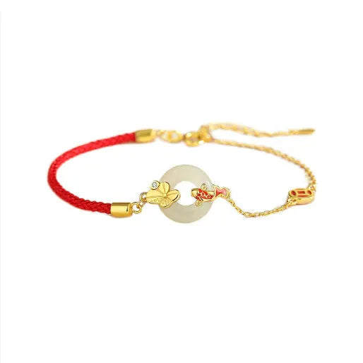 Gold koi peace buckle bracelet made from 925 silver with red rope closure