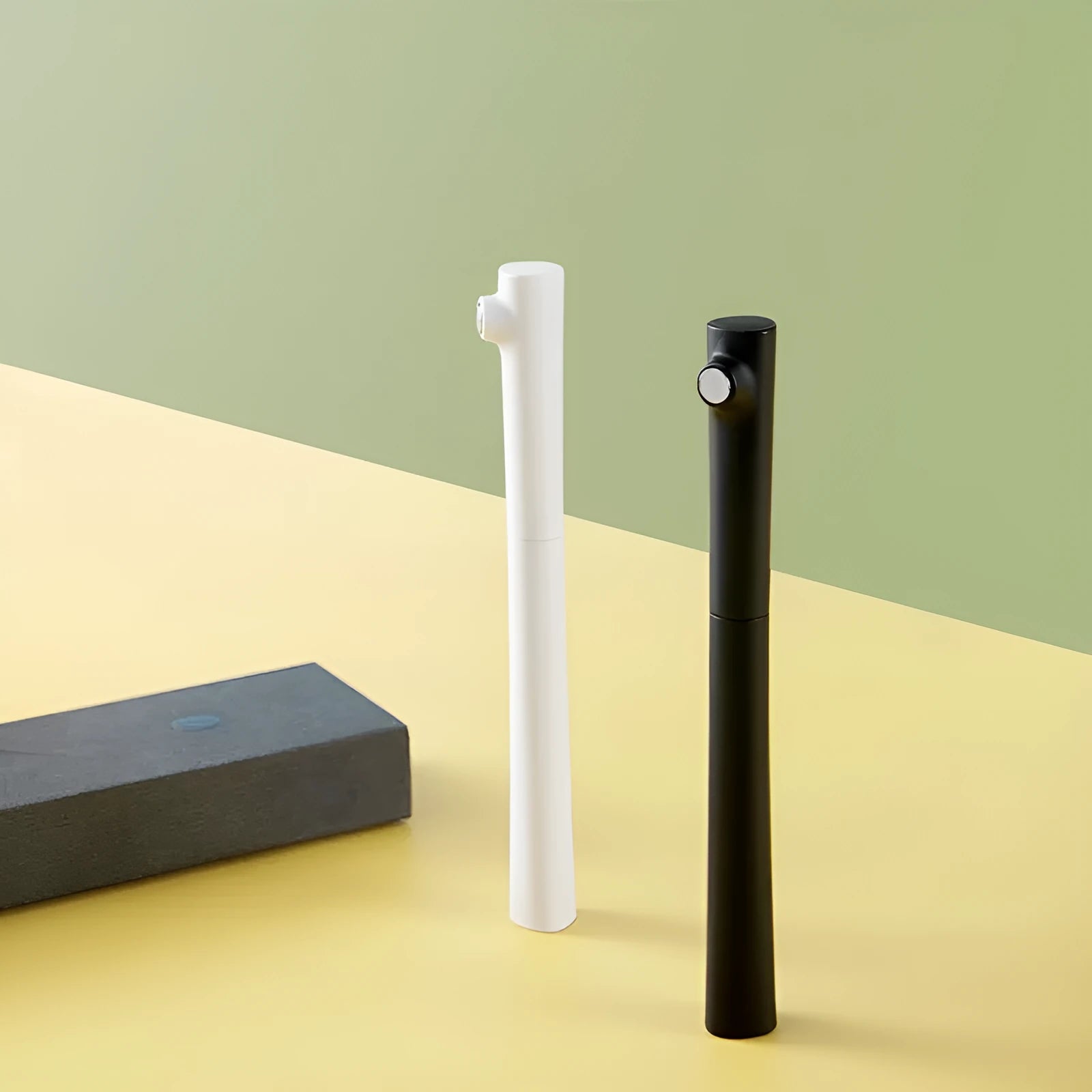 Red Dot Award fountain pen with 0.7mm stainless steel nib in black or white resin holder.