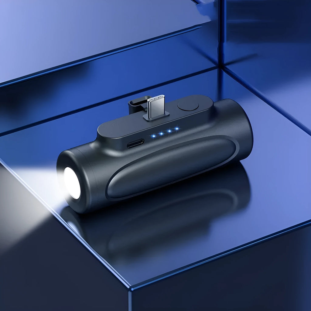 Black creative power bank with integrated LED flashlight, showing USB-C port, dimensions 83x27x41mm.