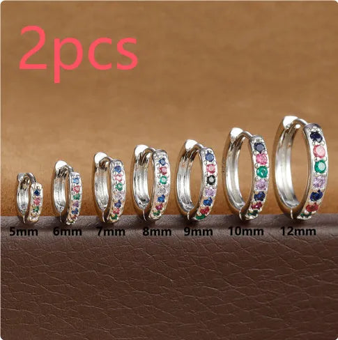 Circle zircon perforated stud earrings in gold, rose gold, and silver colours showing different size options