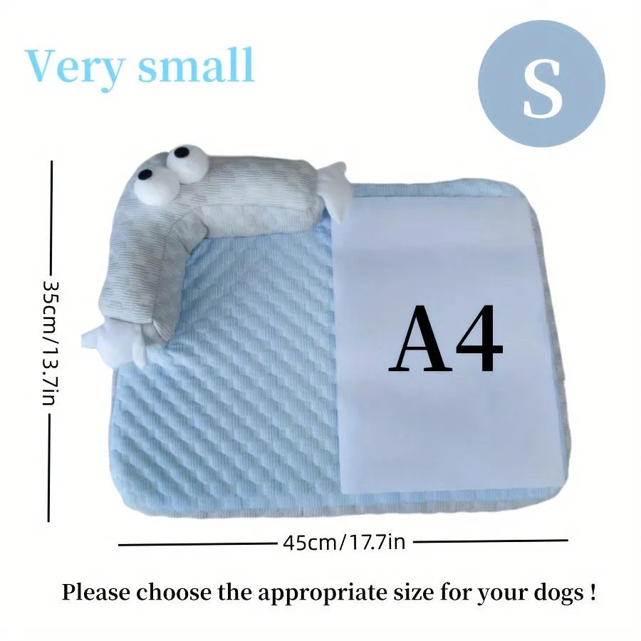 Blue monster design non-slip pet cooling bed for a dog on a hardwood floor.