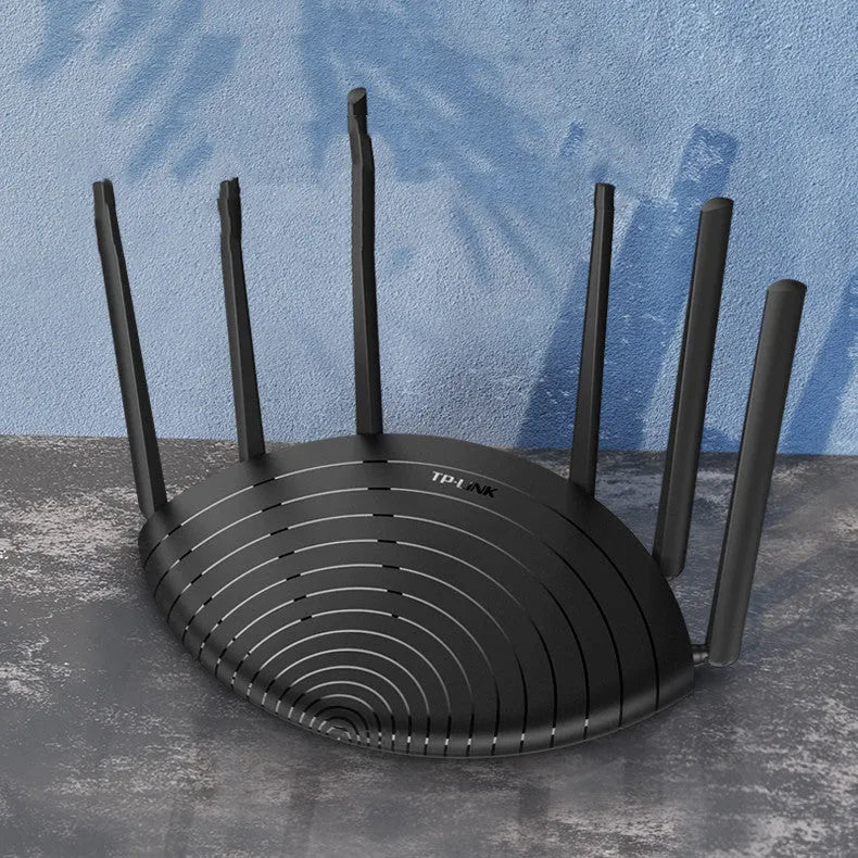 TP-Link TL-WDR7661 AC1900 Gigabit wireless router in a compact black design.