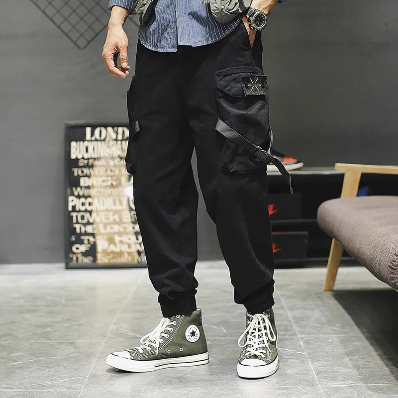Men's cotton cargo pants in black, grey, and khaki, casual multi-pocket trousers with size chart.