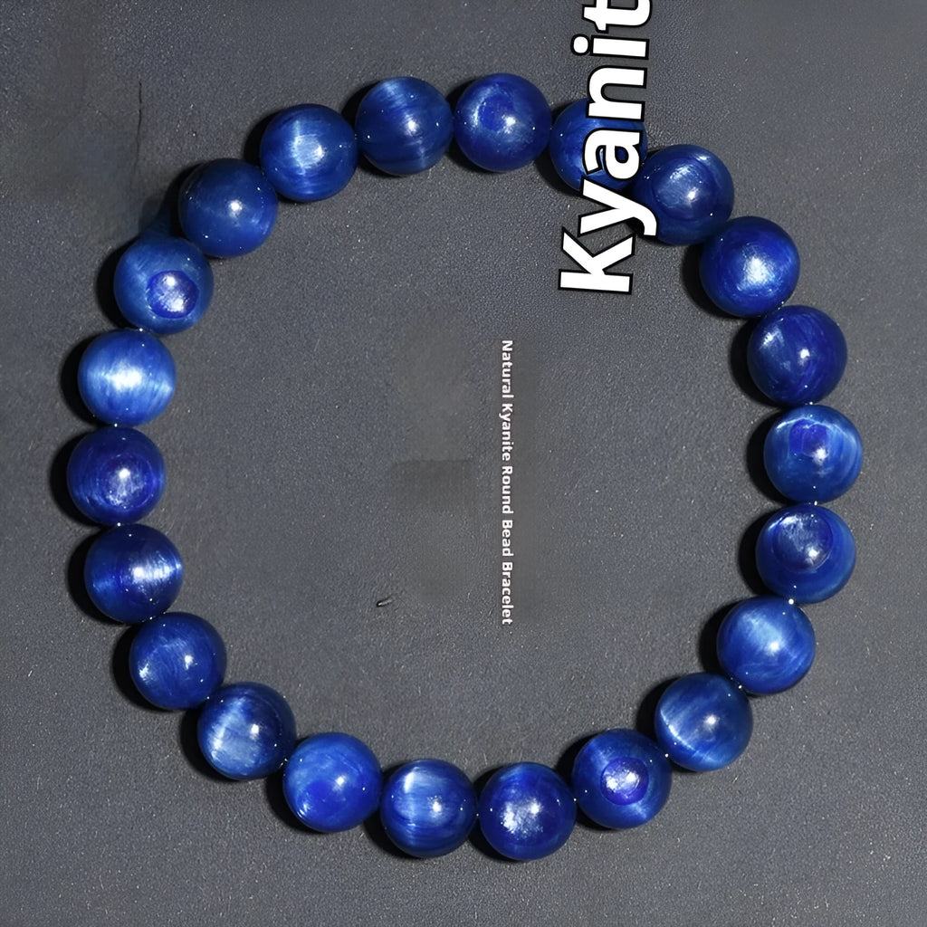 Natural blue grade 7A crystal bracelet with geometric bead and Ruyi charm on wrist.