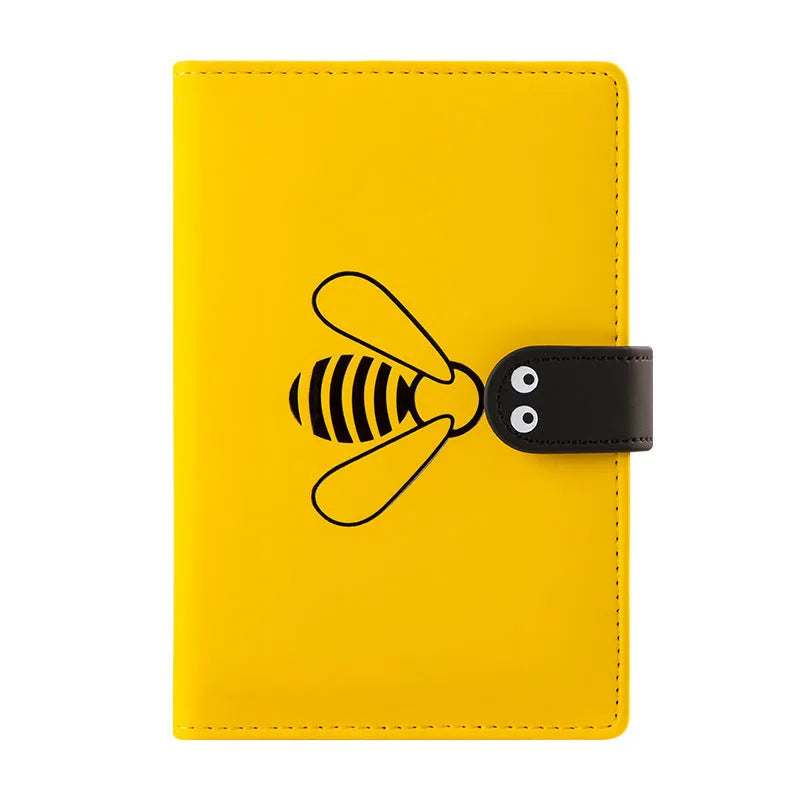 Open B6 notebook with 144 sheets, black PU cover, on a wooden desk