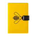 Open B6 notebook with 144 sheets, black PU cover, on a wooden desk